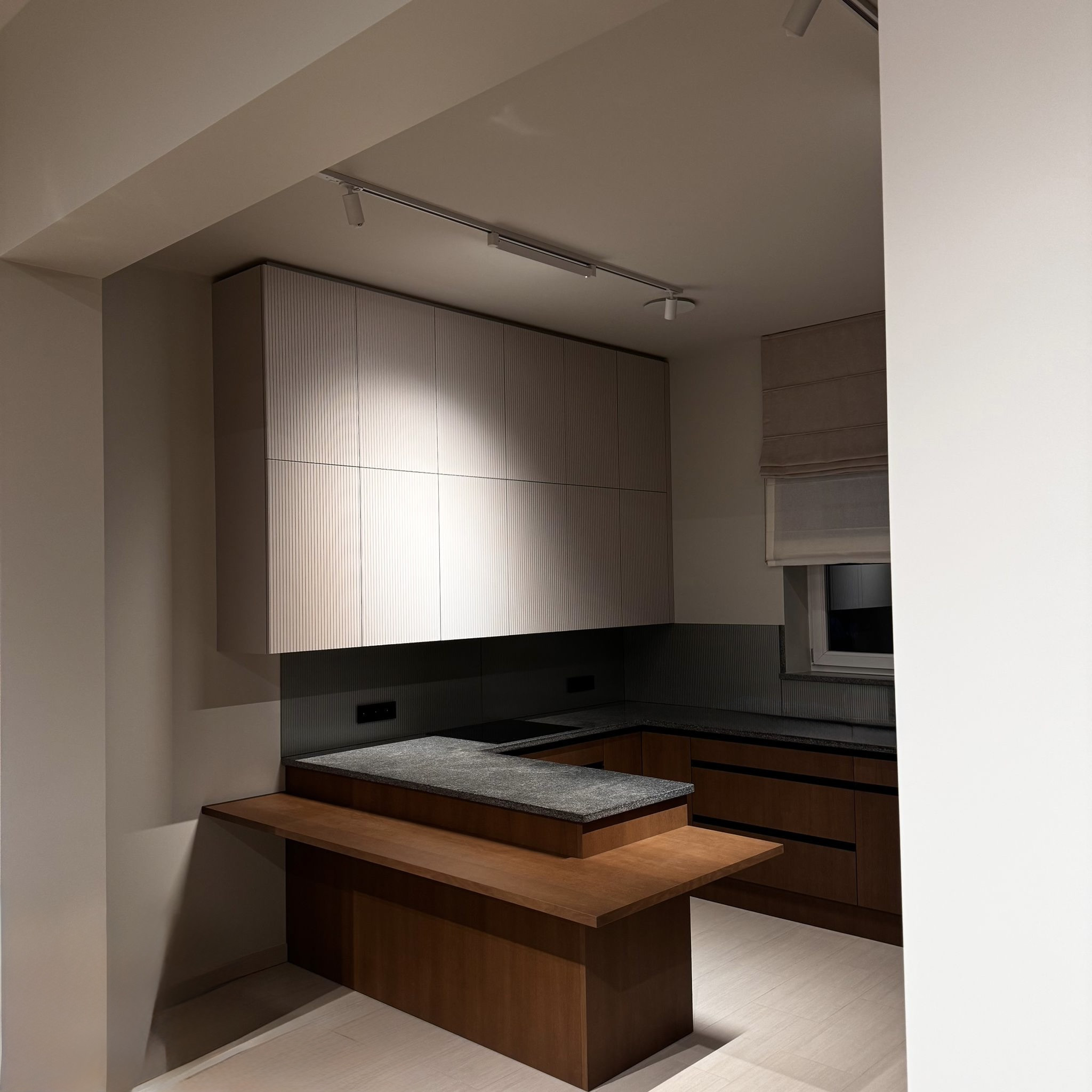 Custom wood kitchen with stone worktop